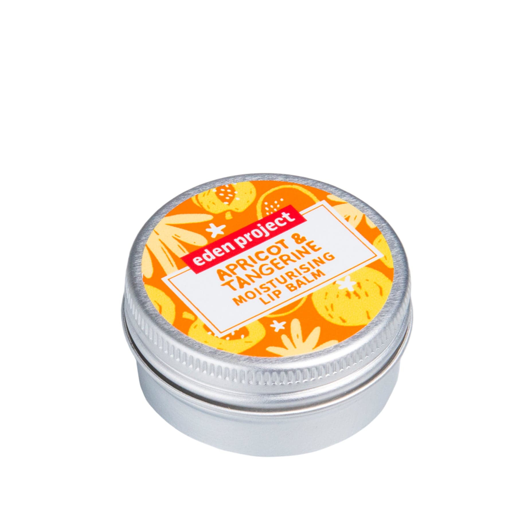 Apricot and Tangerine Moisturizing Lip Balm in tin container from Eden Project on white background.