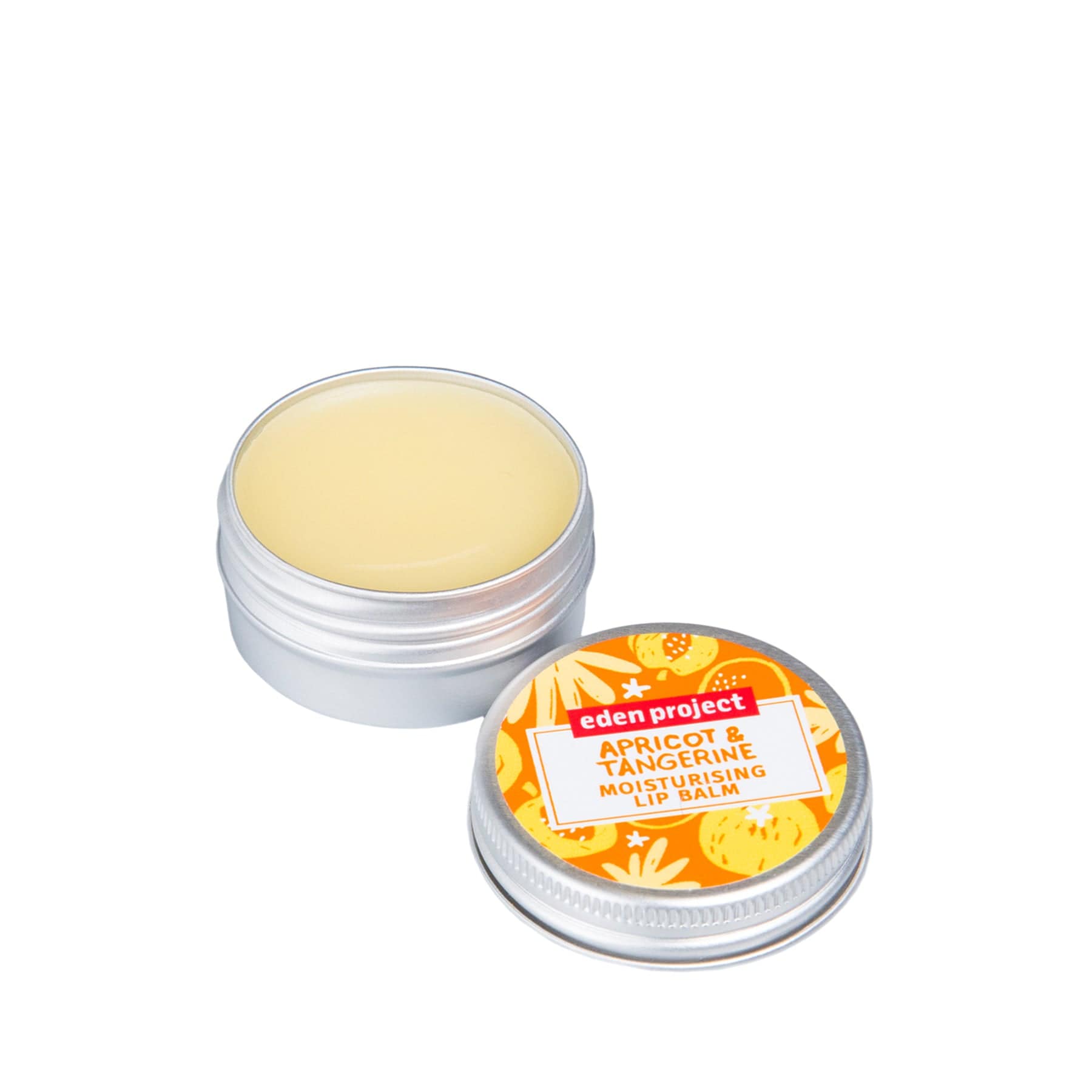 Open container of apricot and tangerine moisturizing lip balm with Eden Project branding on white background