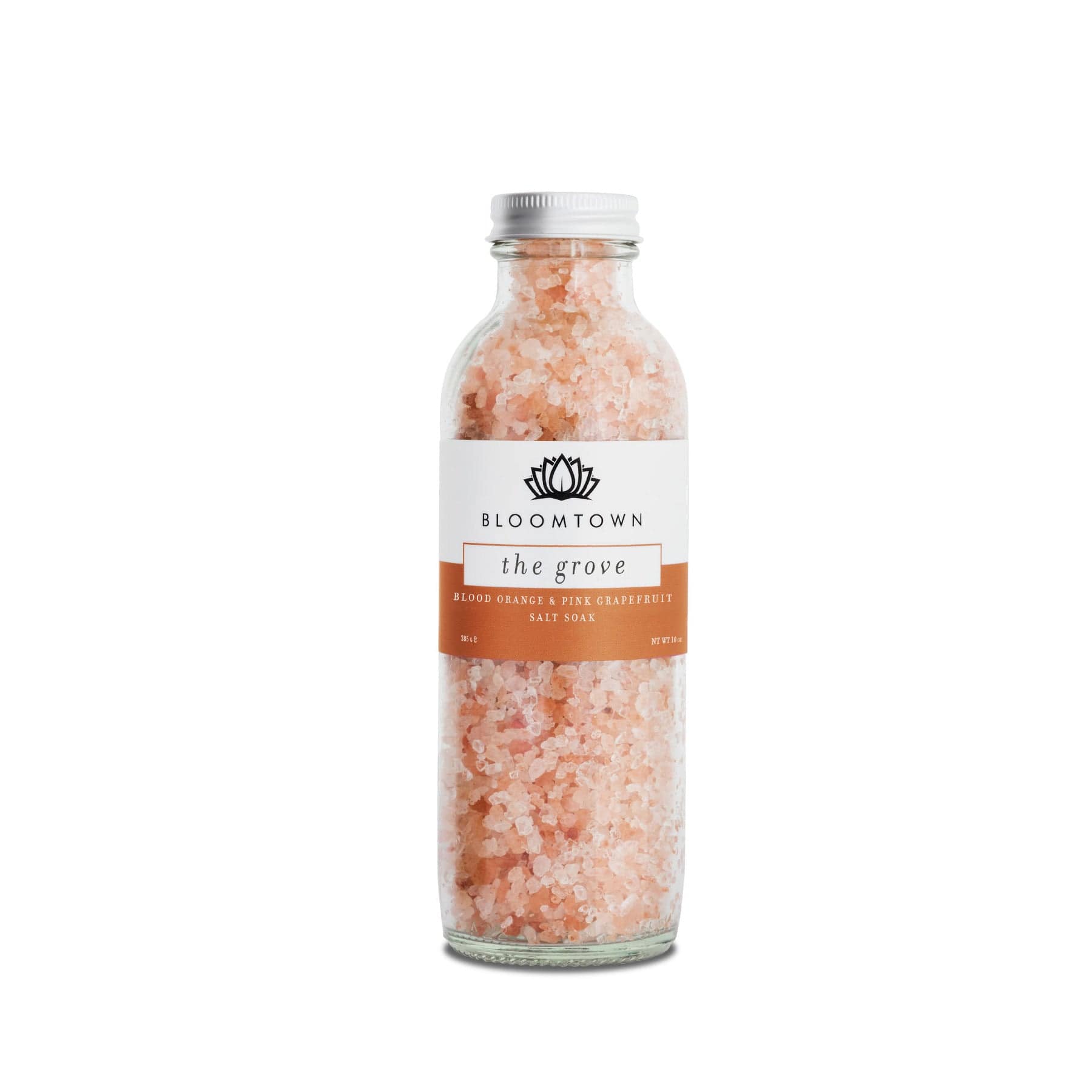 Bloomtown The Grove bath salts in glass bottle, blood orange and pink grapefruit scented salt soak, natural skincare, vegan, cruelty-free beauty product on white background