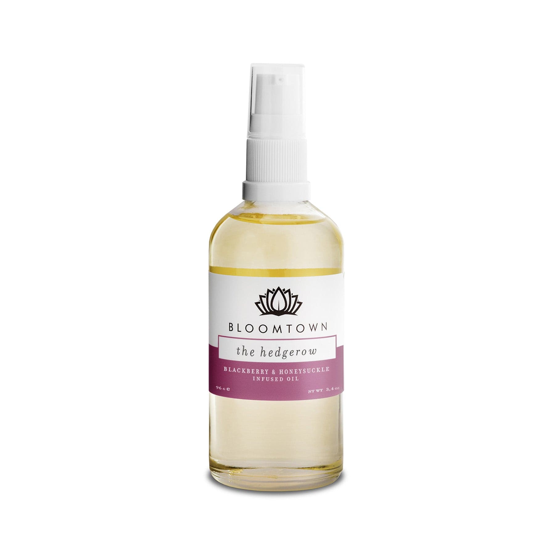 Bloomtown The Hedgerow infused oil in a clear glass spray bottle with blackberry & honeysuckle labels on white background.