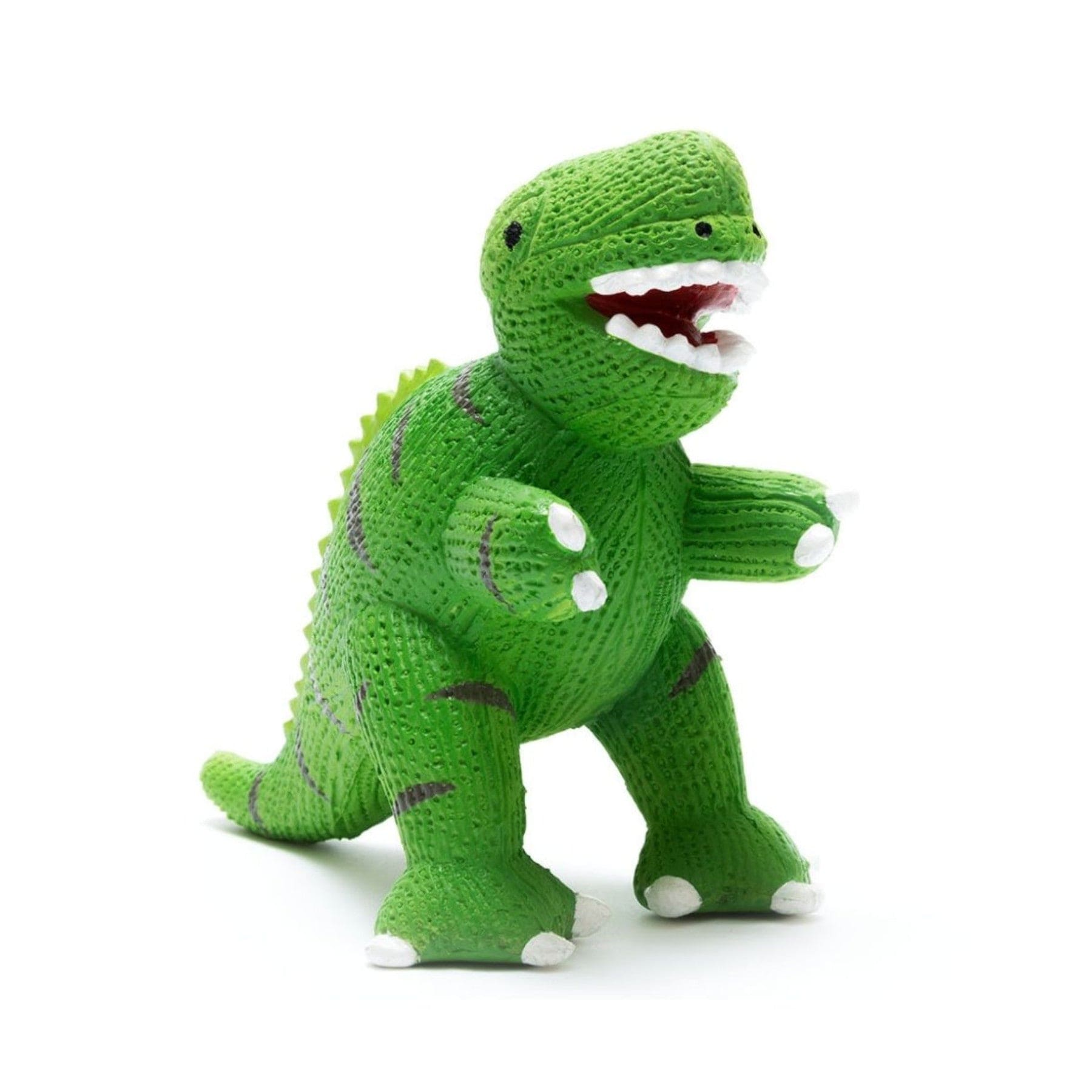 Green knitted dinosaur toy standing isolated on white background