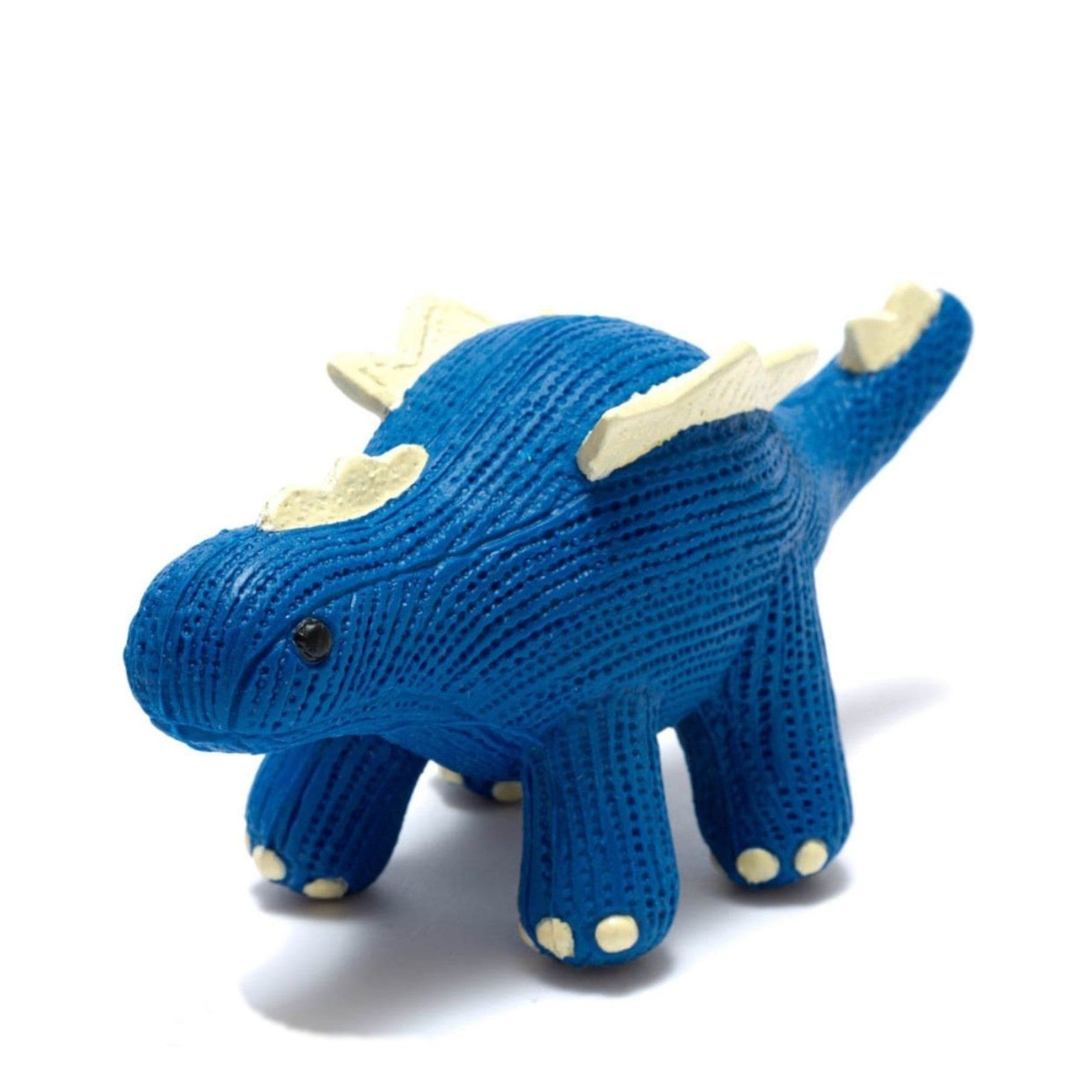 Blue knitted stegosaurus dinosaur toy isolated on white background