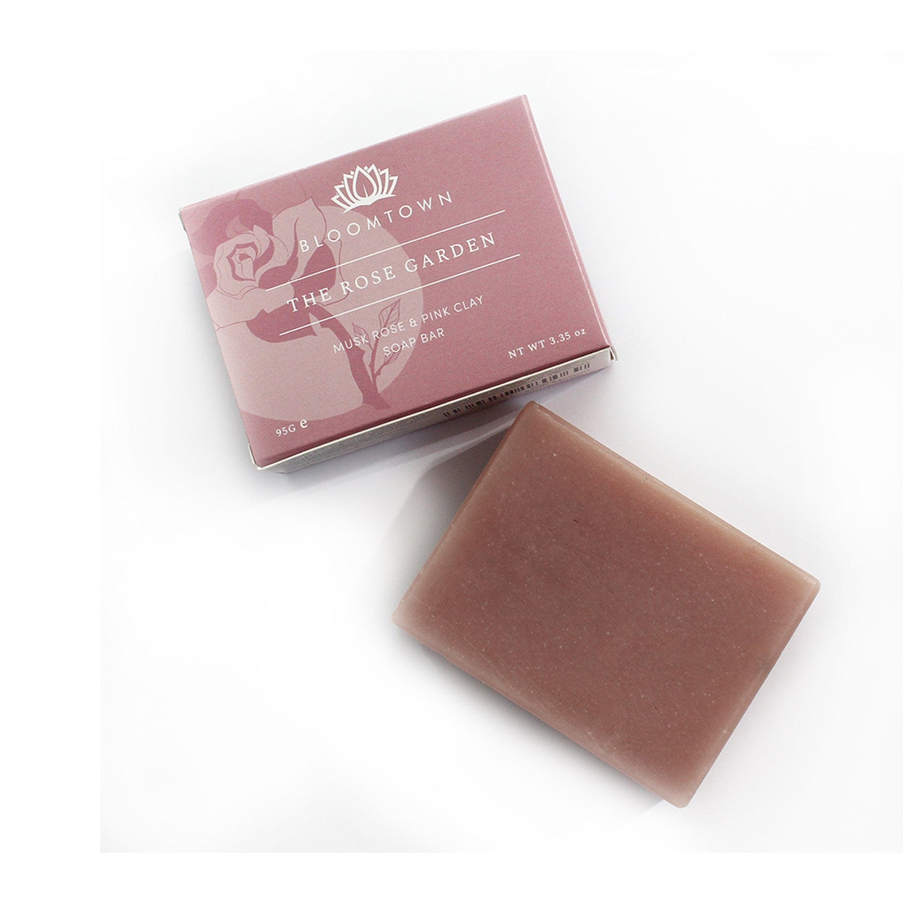 Bloomtown The Rose Garden musk rose and pink clay soap bar with packaging on white background.