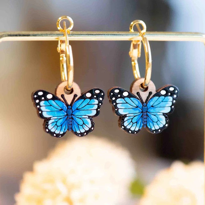 Blue butterfly hoop earrings