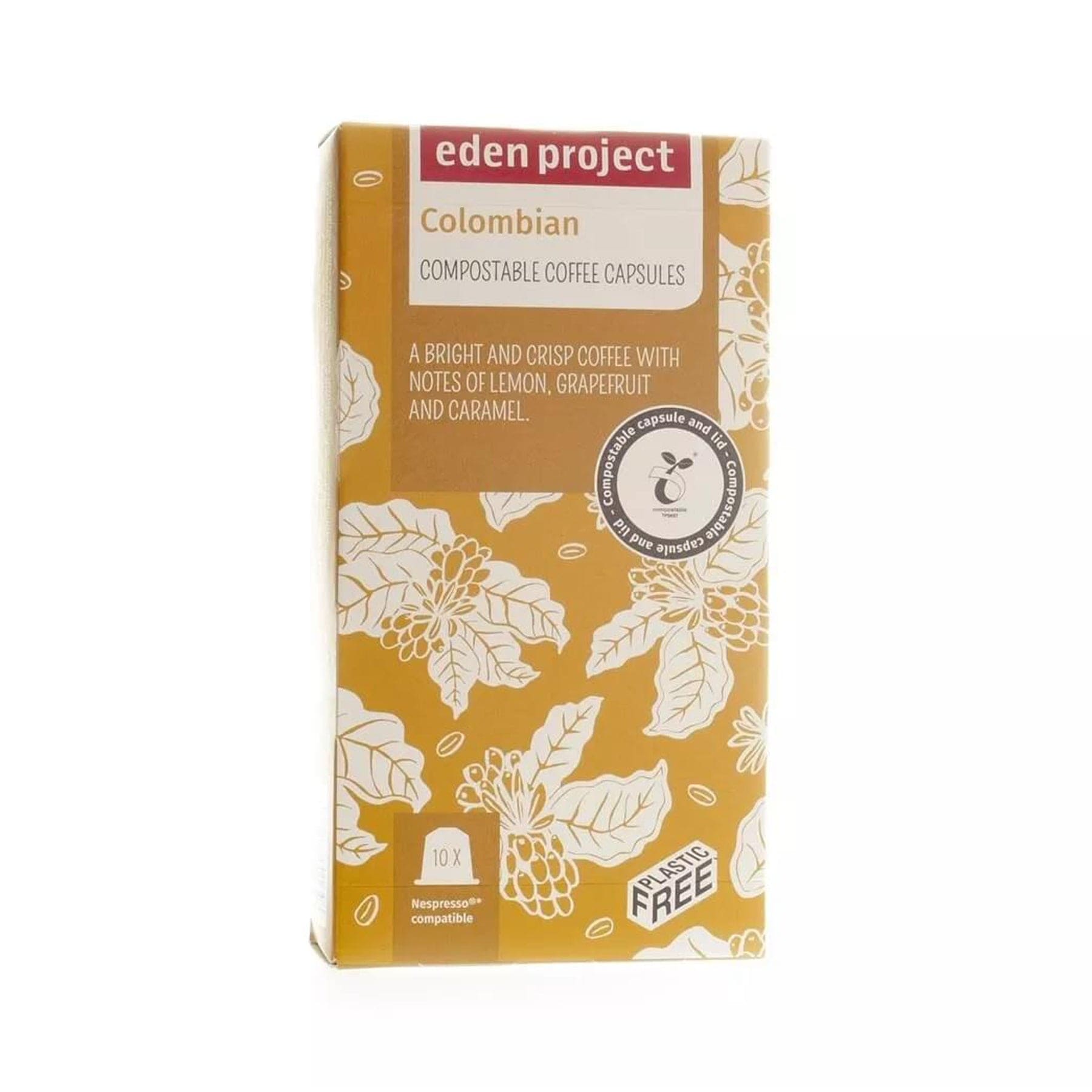 Eden Project Colombian compostable coffee capsules packaging with floral design, notes of lemon, grapefruit, and caramel, Nespresso compatible, plastic-free label.