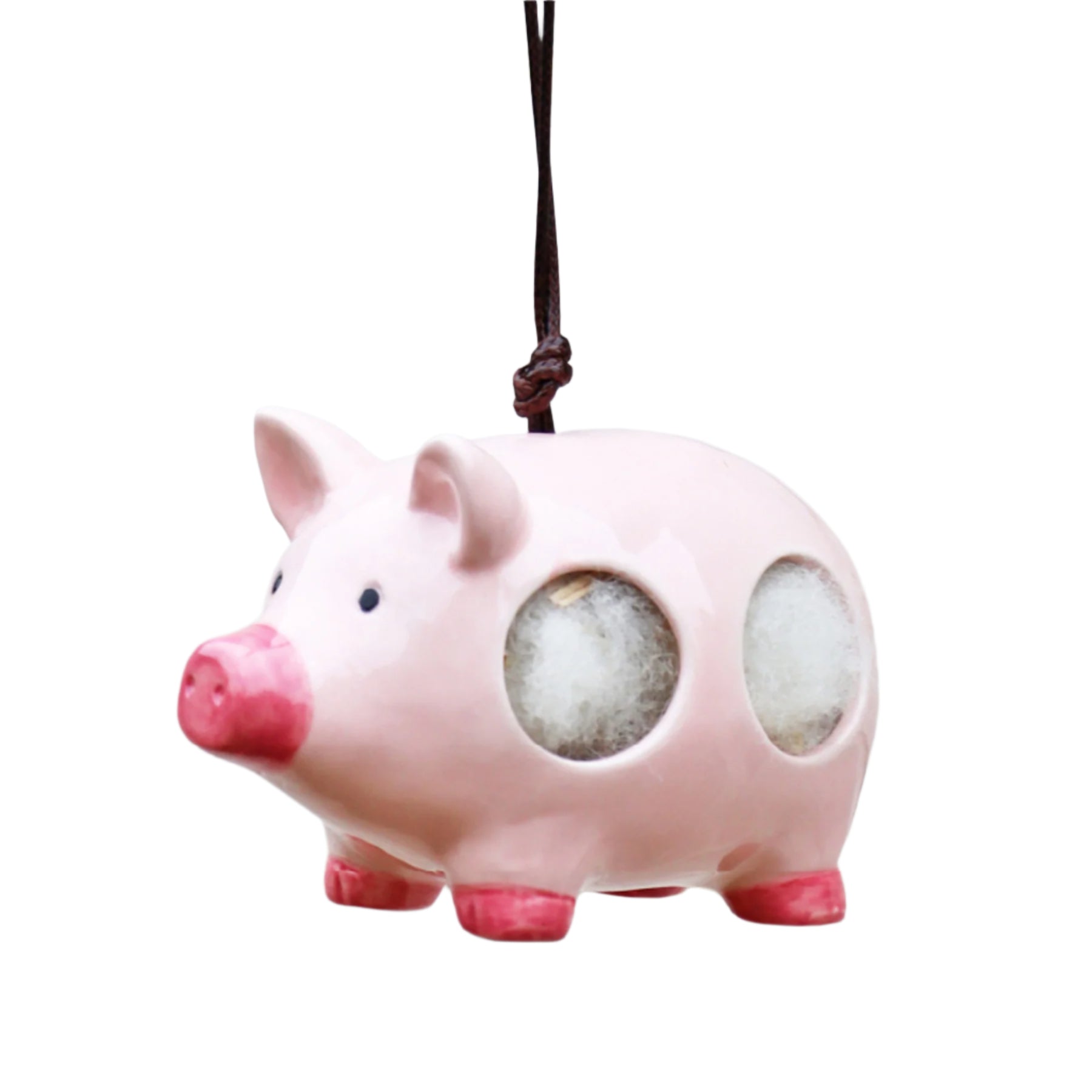 'Curlie' hanging ceramic pig with nesting wool