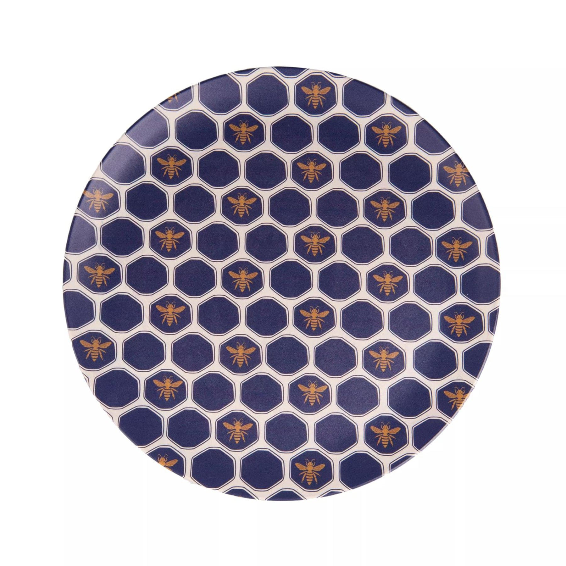Round blue and gold patterned plate with hexagonal shapes and bee motifs on a white background.