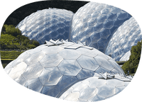 Geodesic domes with hexagonal pattern cladding at Eden Project, Cornwall, sustainable architecture, environmental conservation, botanical garden biodomes, eco-tourism attraction, futuristic structures, transparent biomes in landscape