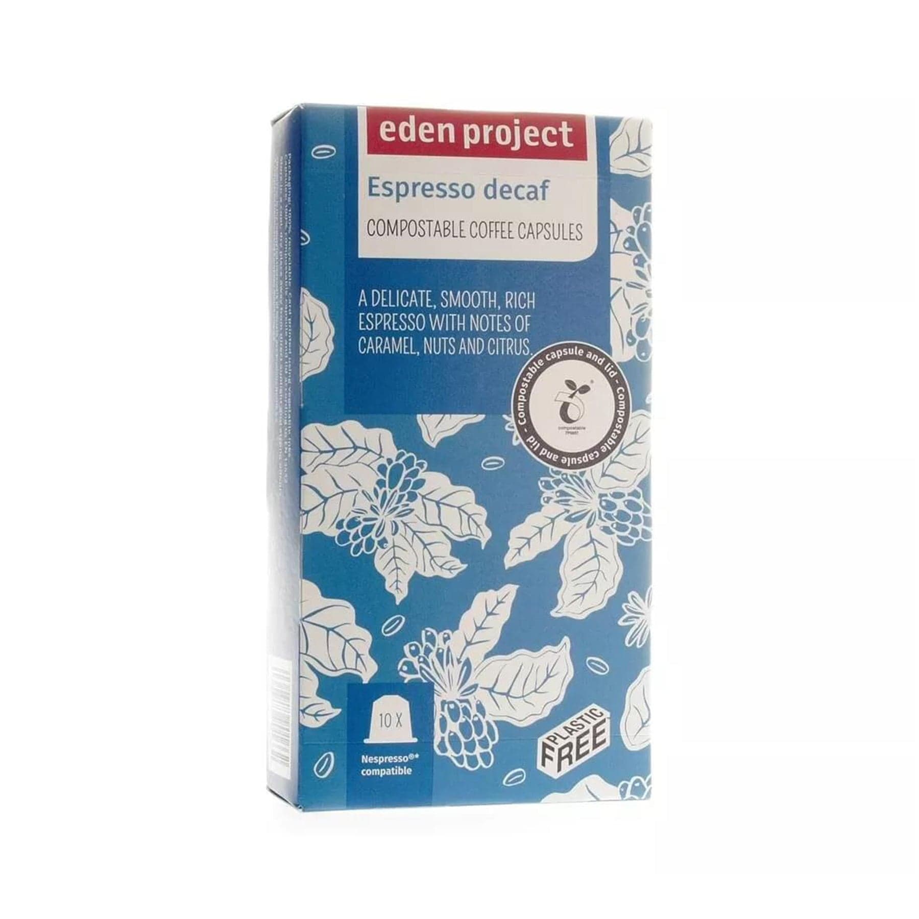 Eden Project compostable coffee capsules box, Espresso Decaf, eco-friendly Nespresso compatible pods packaging with floral design, caramel nuts citrus flavor notes, plastic-free initiative emblems.