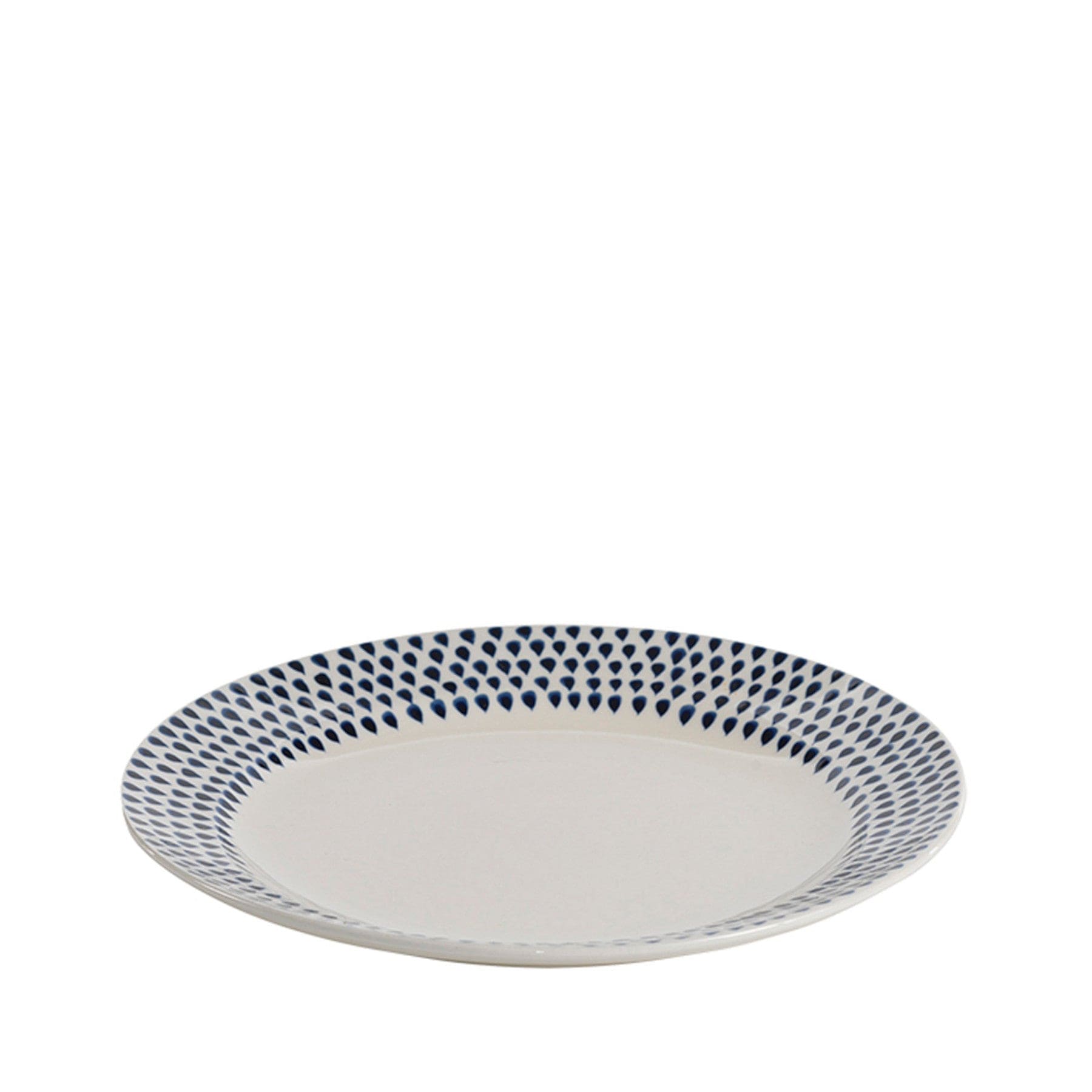 Ceramic plate with blue geometric pattern on rim, white center, round dishware on white background