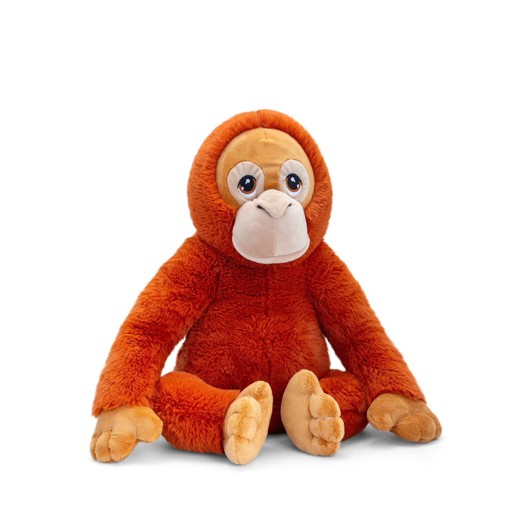 Orange plush monkey toy with sad eyes sitting isolated on white background.