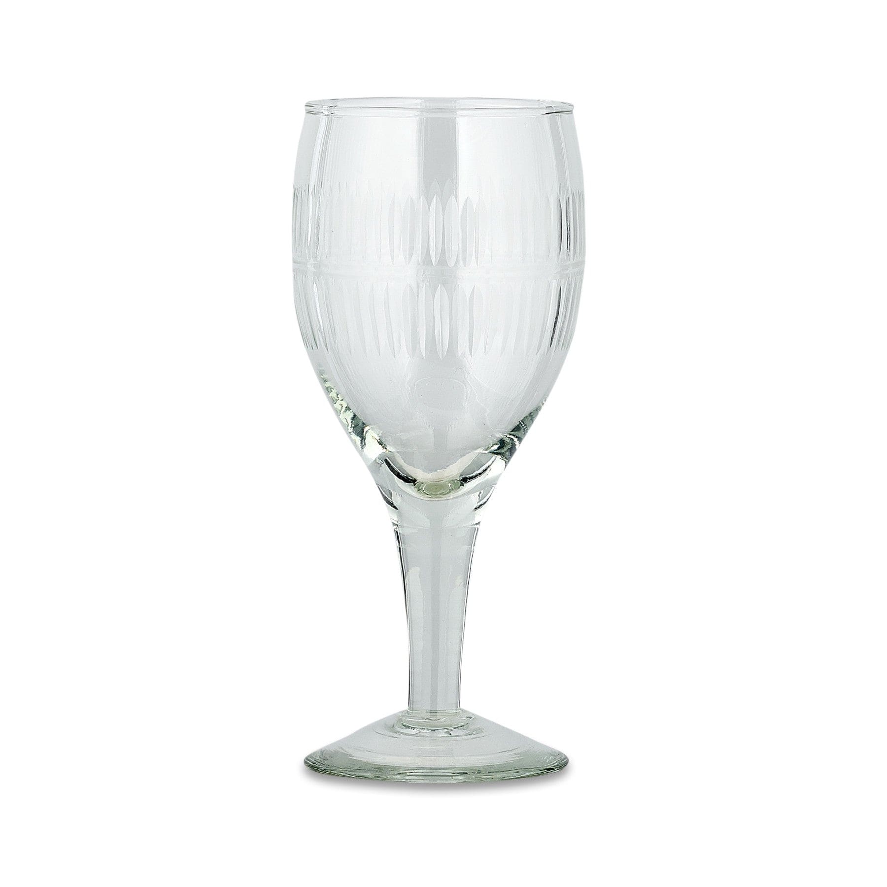 Empty wine glass with ribbed pattern isolated on white background.