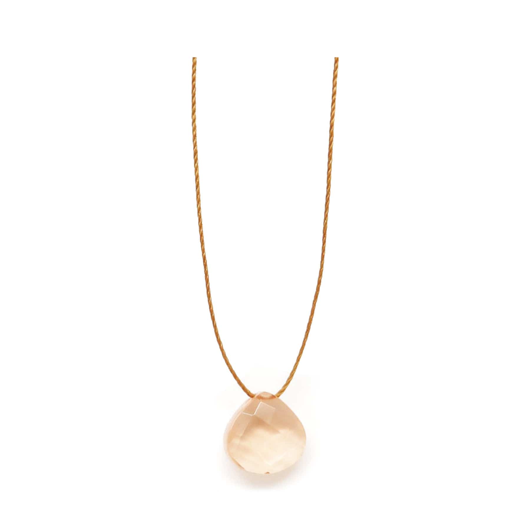 Elegant gold necklace with a single large round opal pendant on a white background.