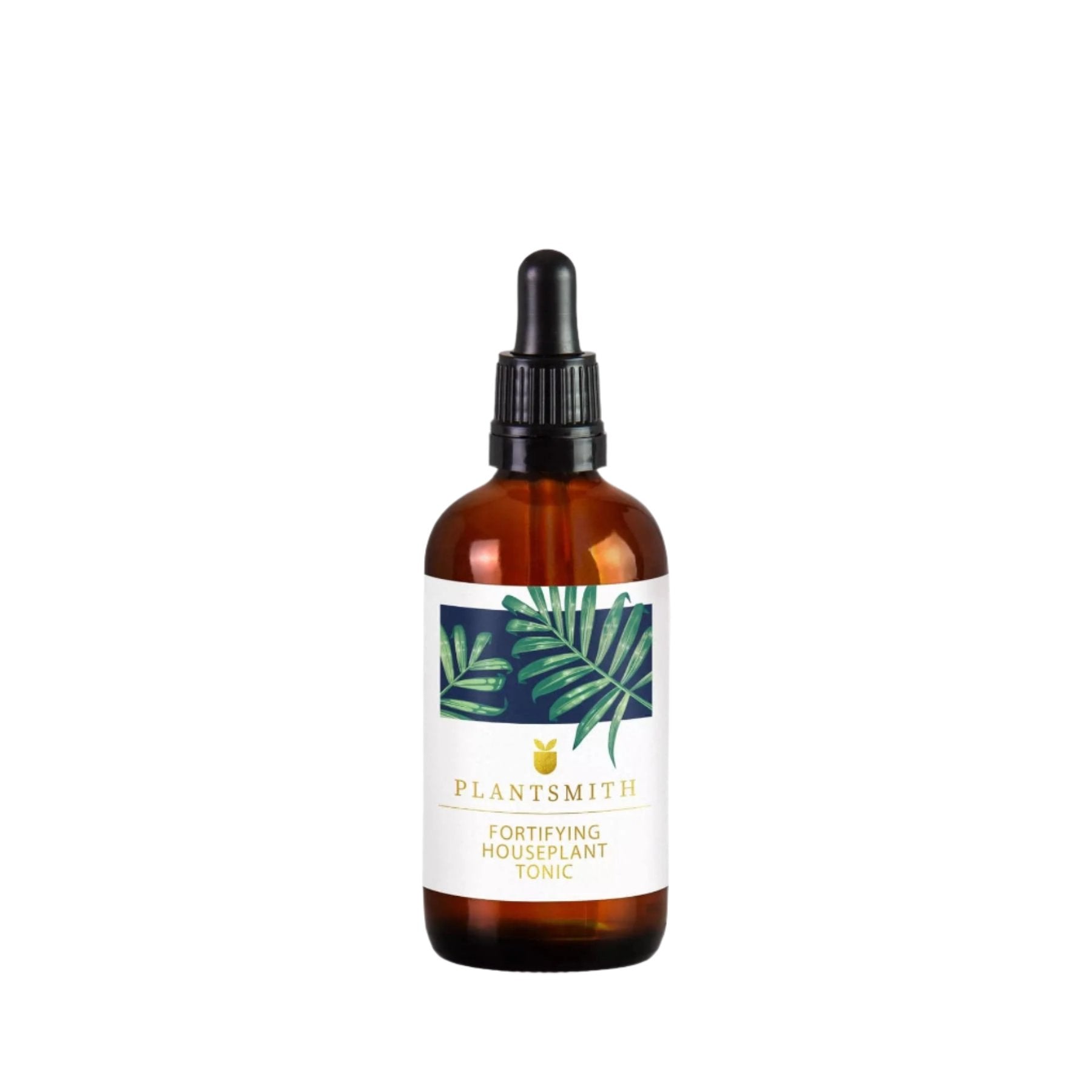 Amber glass bottle with dropper of PLANTSMITH Fortifying Houseplant Tonic with monstera leaf design on label against a white background