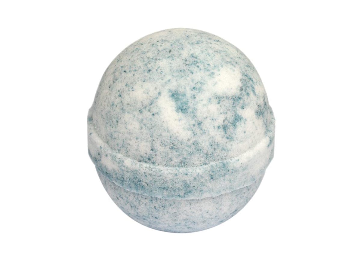 Blue and white bath bomb isolated on white background with a speckled design, round fizzing spa ball, aromatherapy, bath accessory, skincare, wellness, relaxation concept