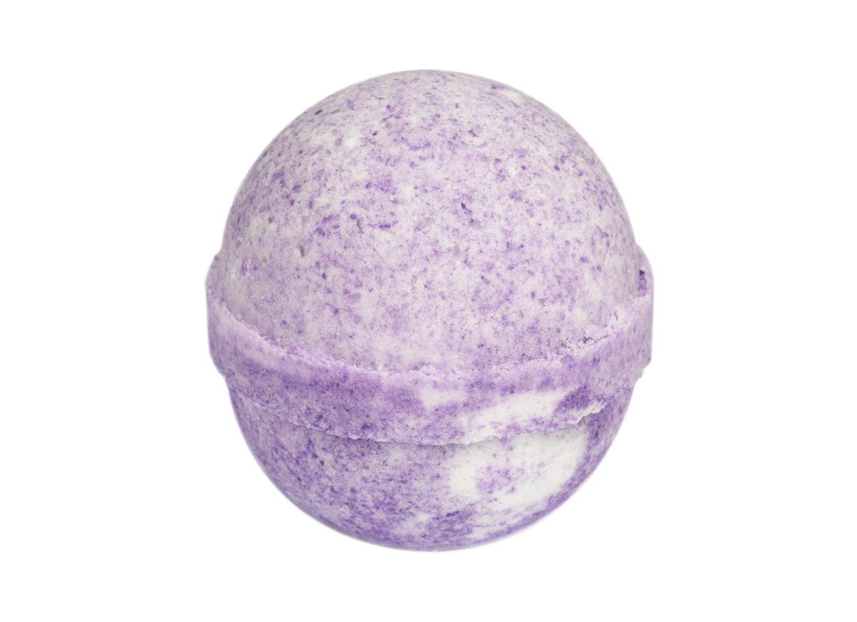Purple and white bath bomb isolated on white background.
