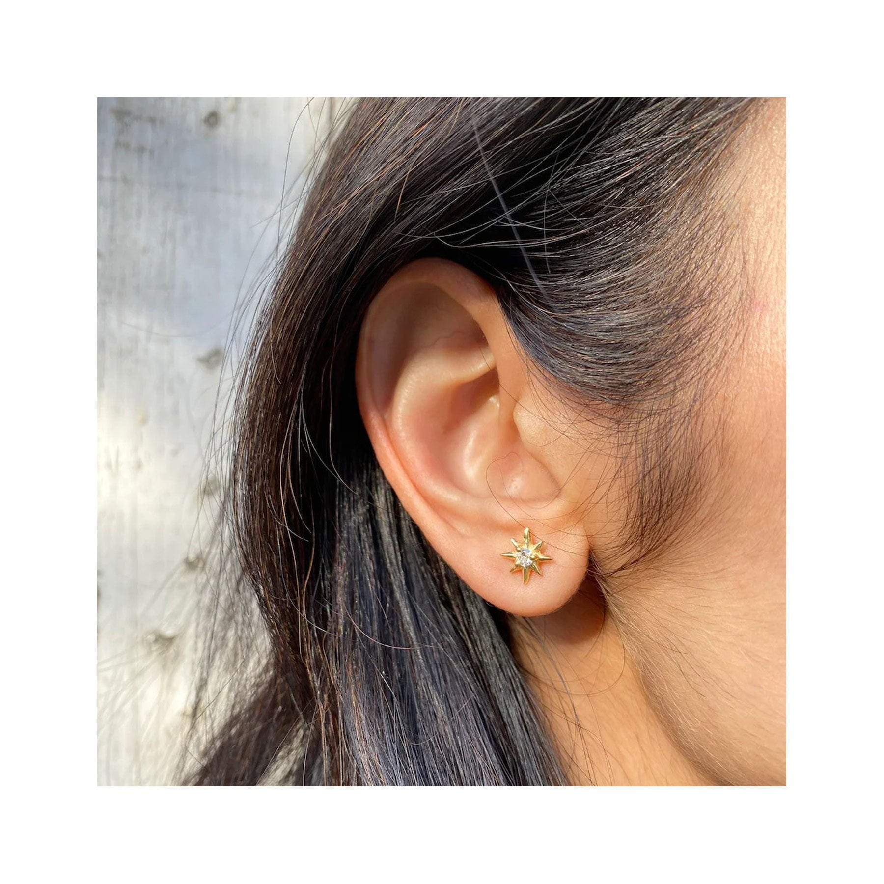 Star earrings gold