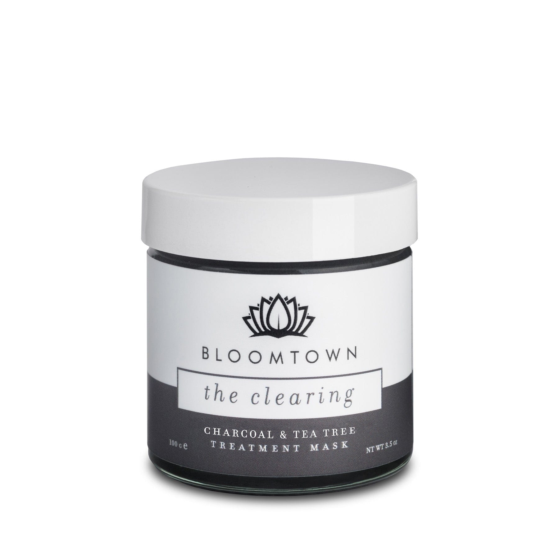Bloomtown The Clearing Charcoal and Tea Tree Treatment Mask skincare product jar isolated on white background