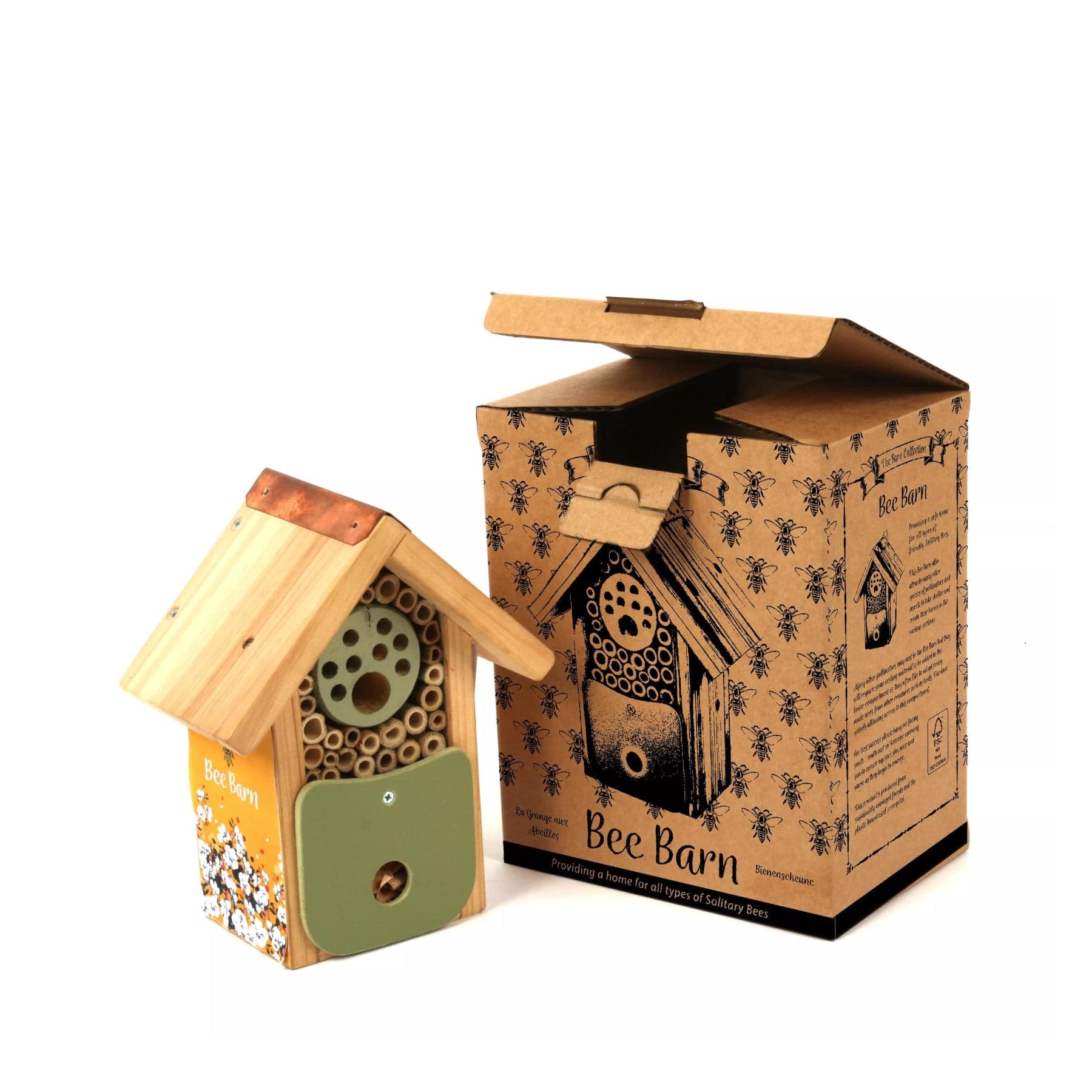 Wooden bee house next to its packaging box with information on solitary bee habitat, eco-friendly beekeeping, and pollinator conservation.