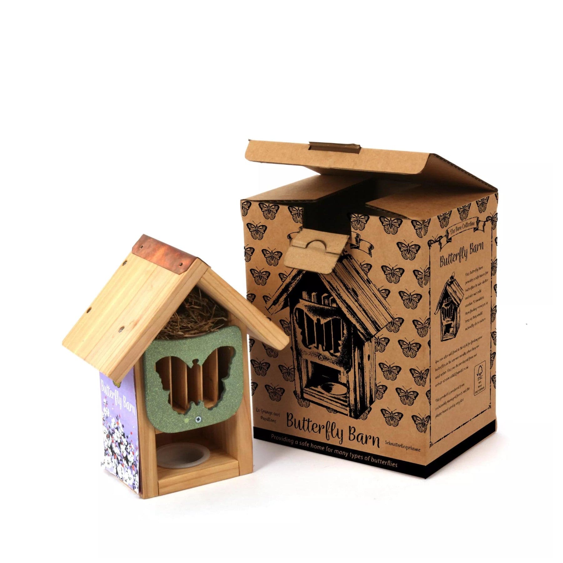 Wooden butterfly house with green roof next to its packaging box with butterfly illustrations on a white background.
