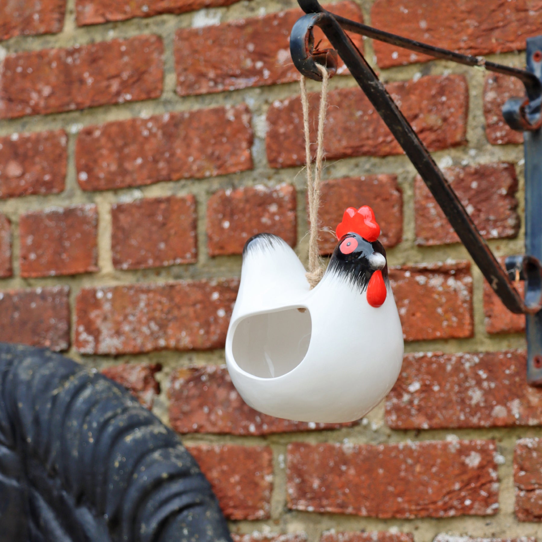 'Cluckie' hanging ceramic hen bird feeder