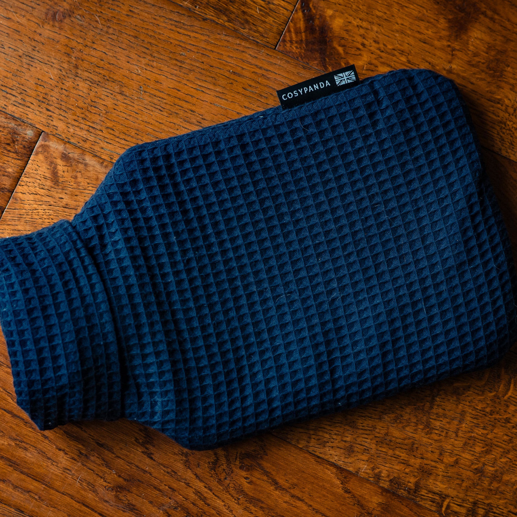 Navy blue luxurious waffle hot water bottle