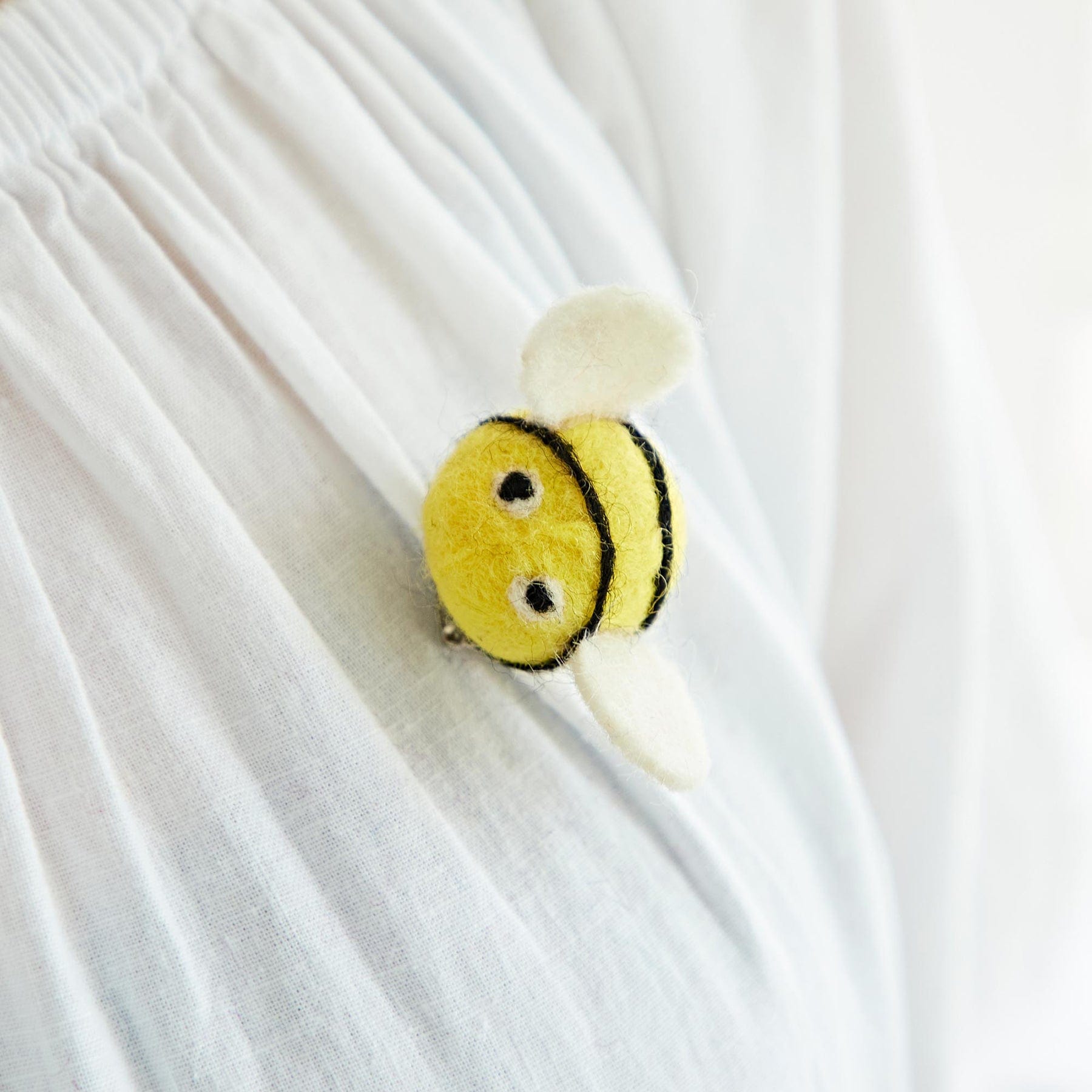 Felt bee brooch