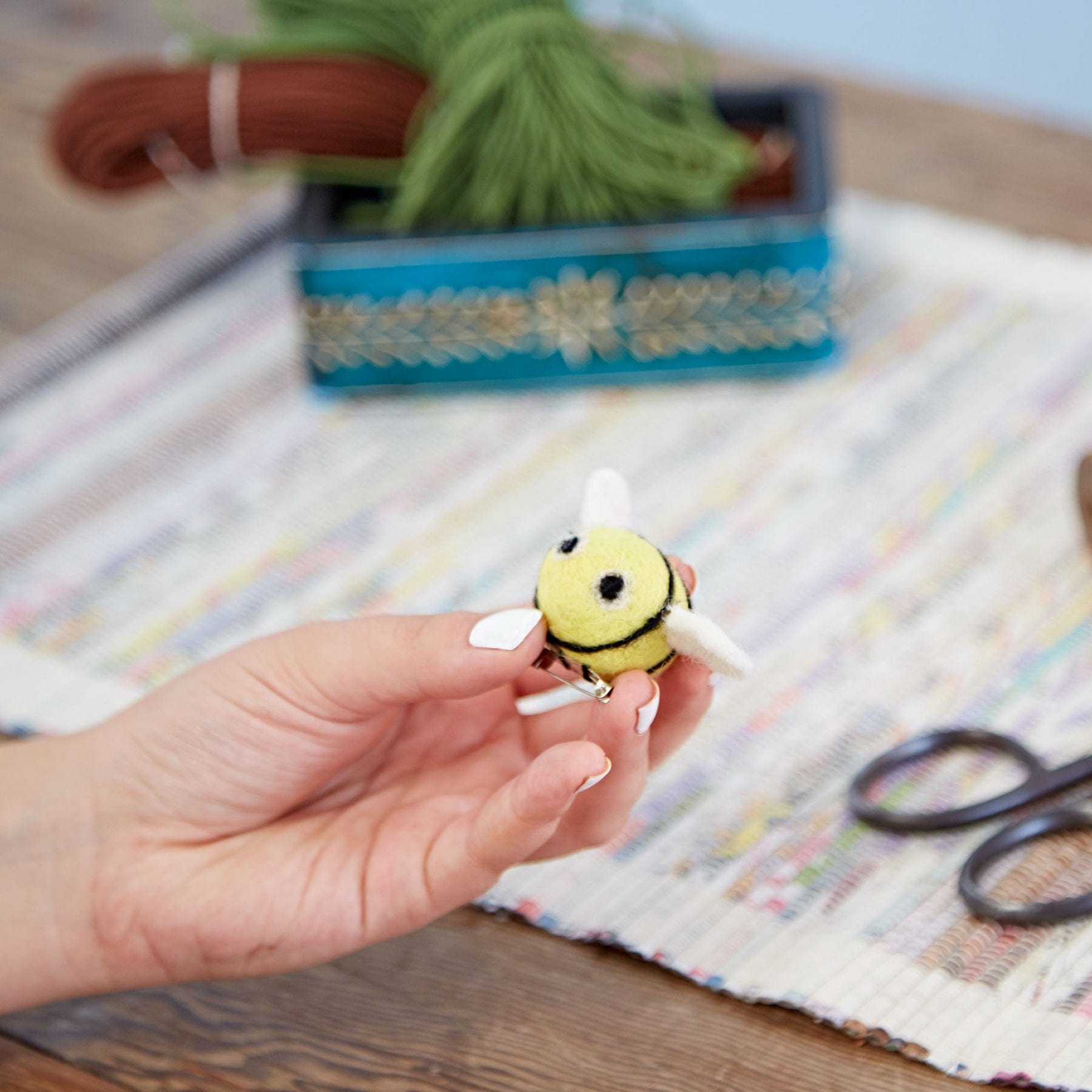 Felt bee brooch