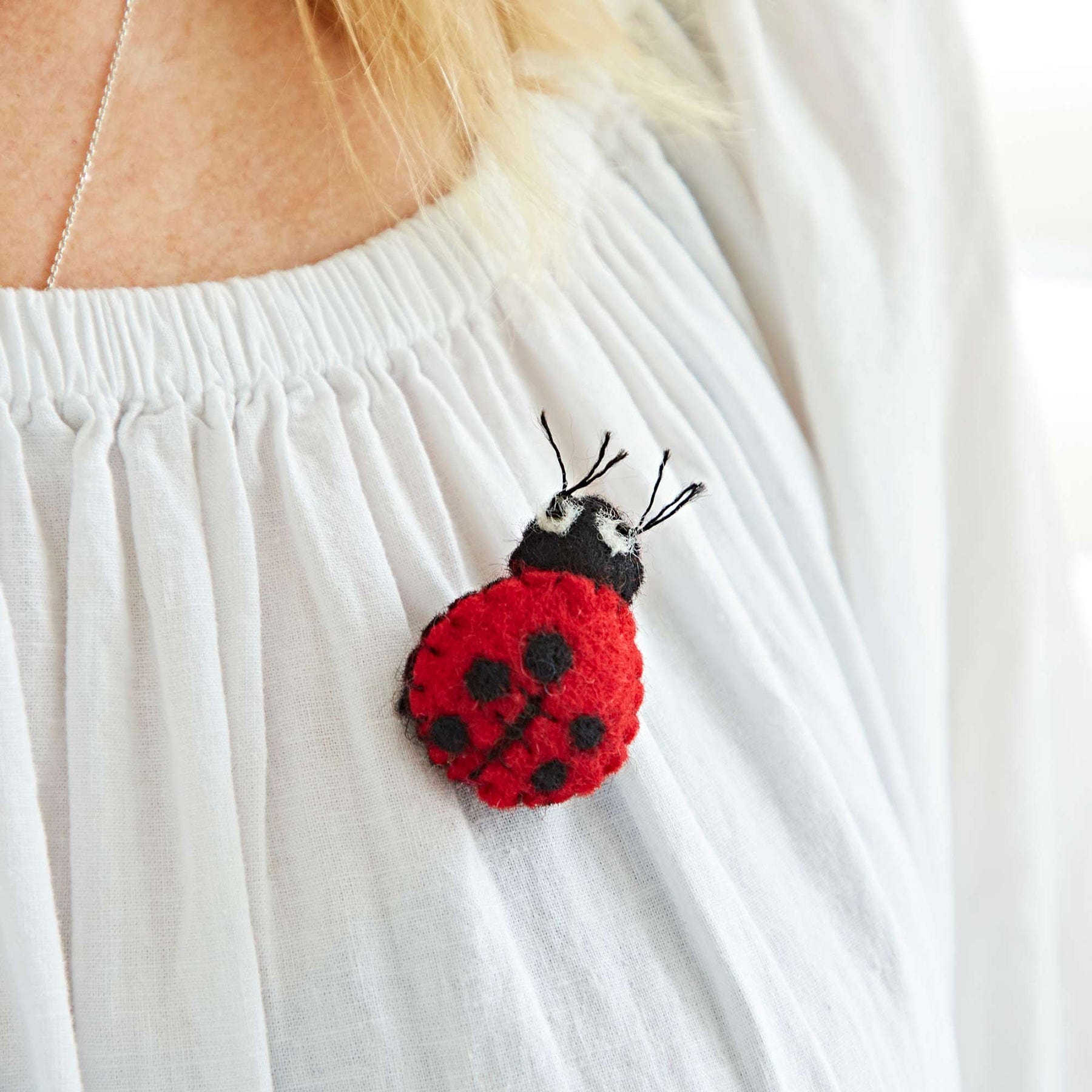 Felt ladybird brooch