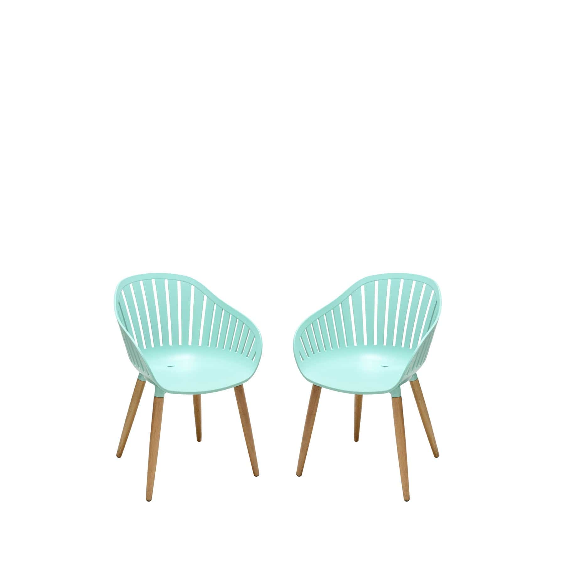 Two mint green modern dining chairs with wooden legs isolated on a white background