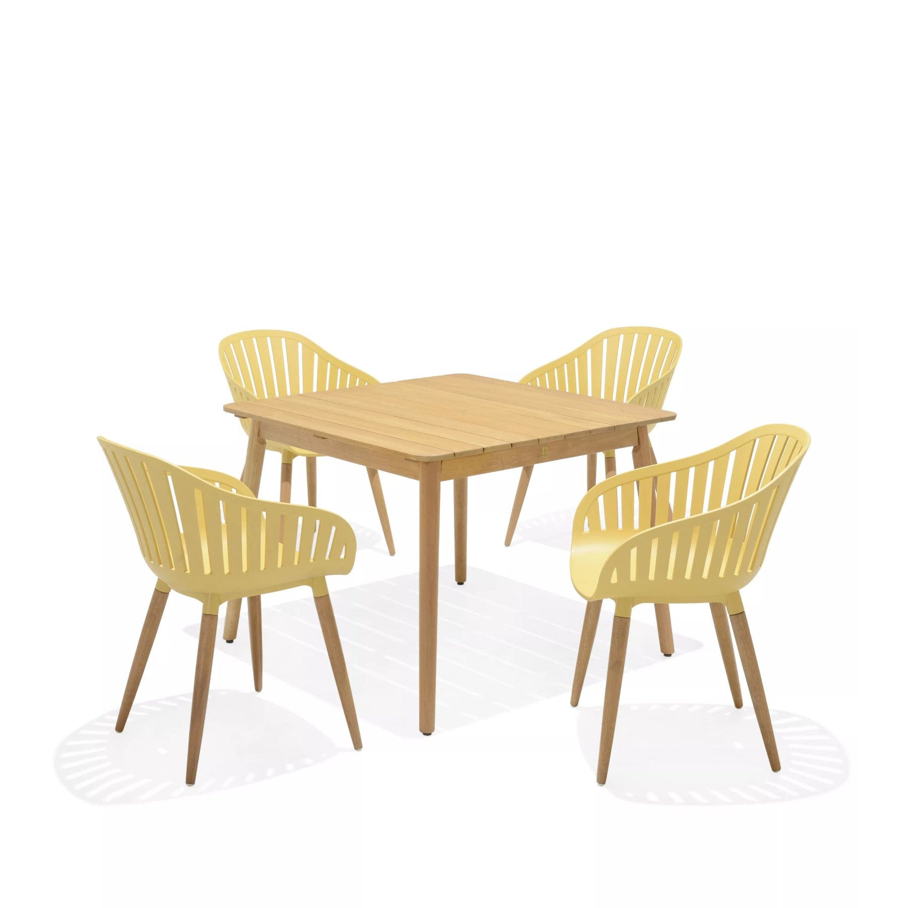 Modern wooden dining table with matching chairs set on a light background