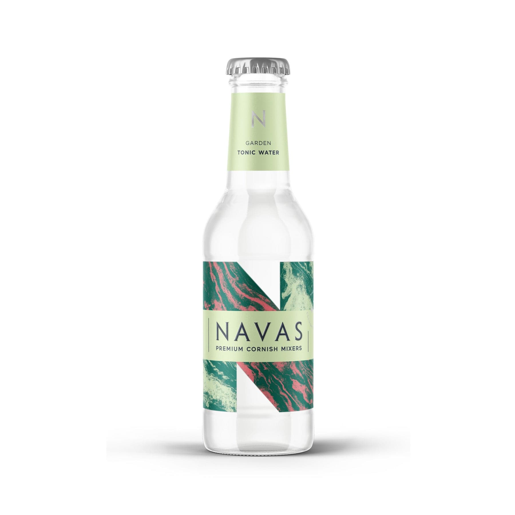 Clear glass bottle of Navas Garden Tonic Water with white and green label, premium Cornish mixers, isolated on white background.
