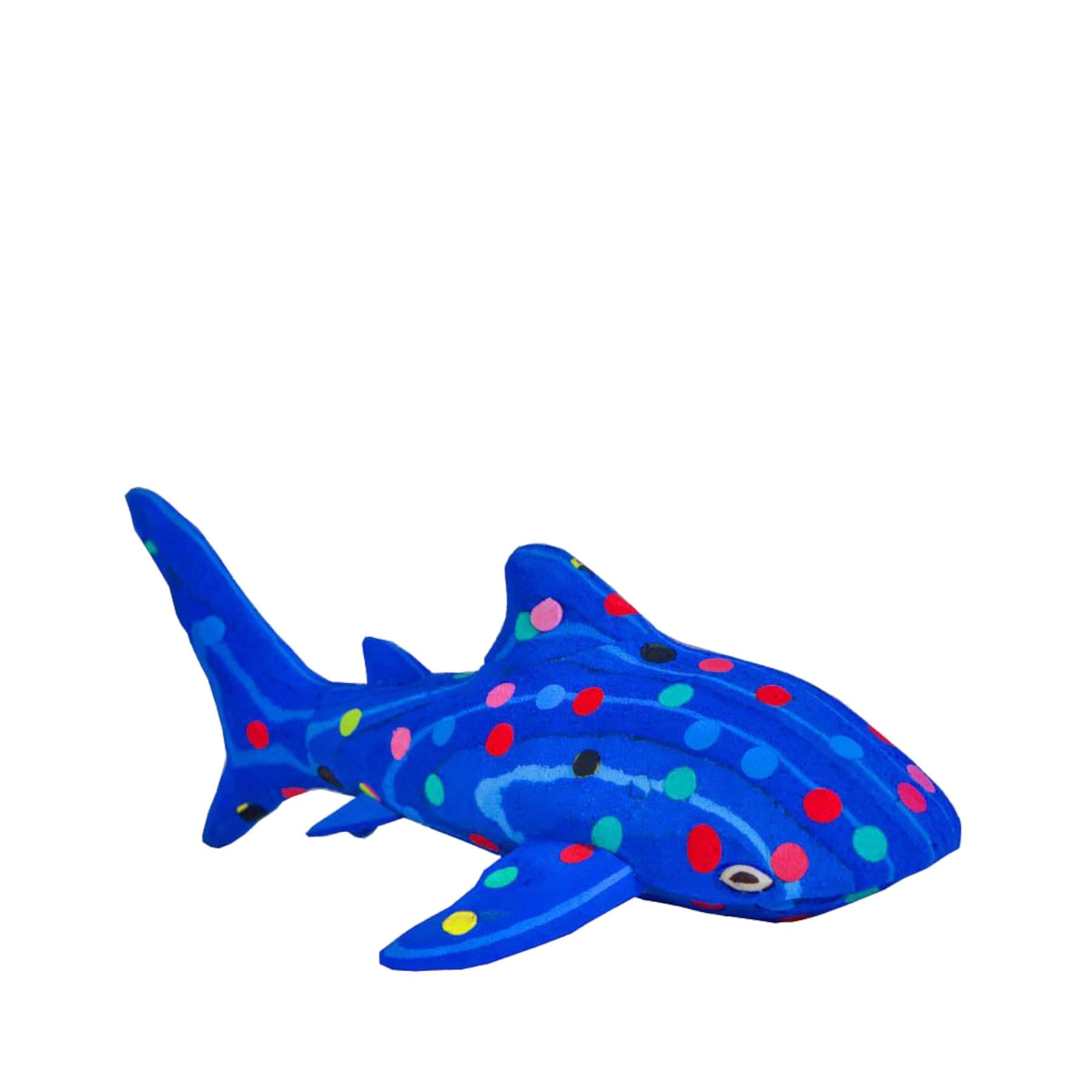 Blue plush shark toy with colorful polka dots isolated on white background