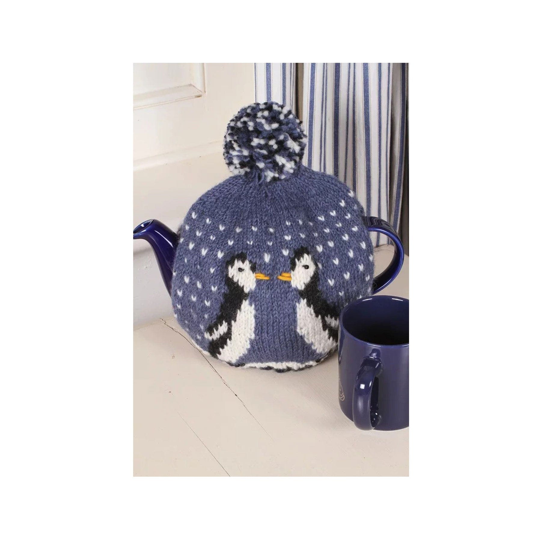 Waddle of penguins tea cosy