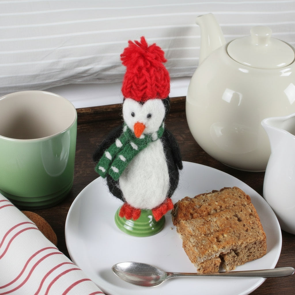 Penguin egg cosy
