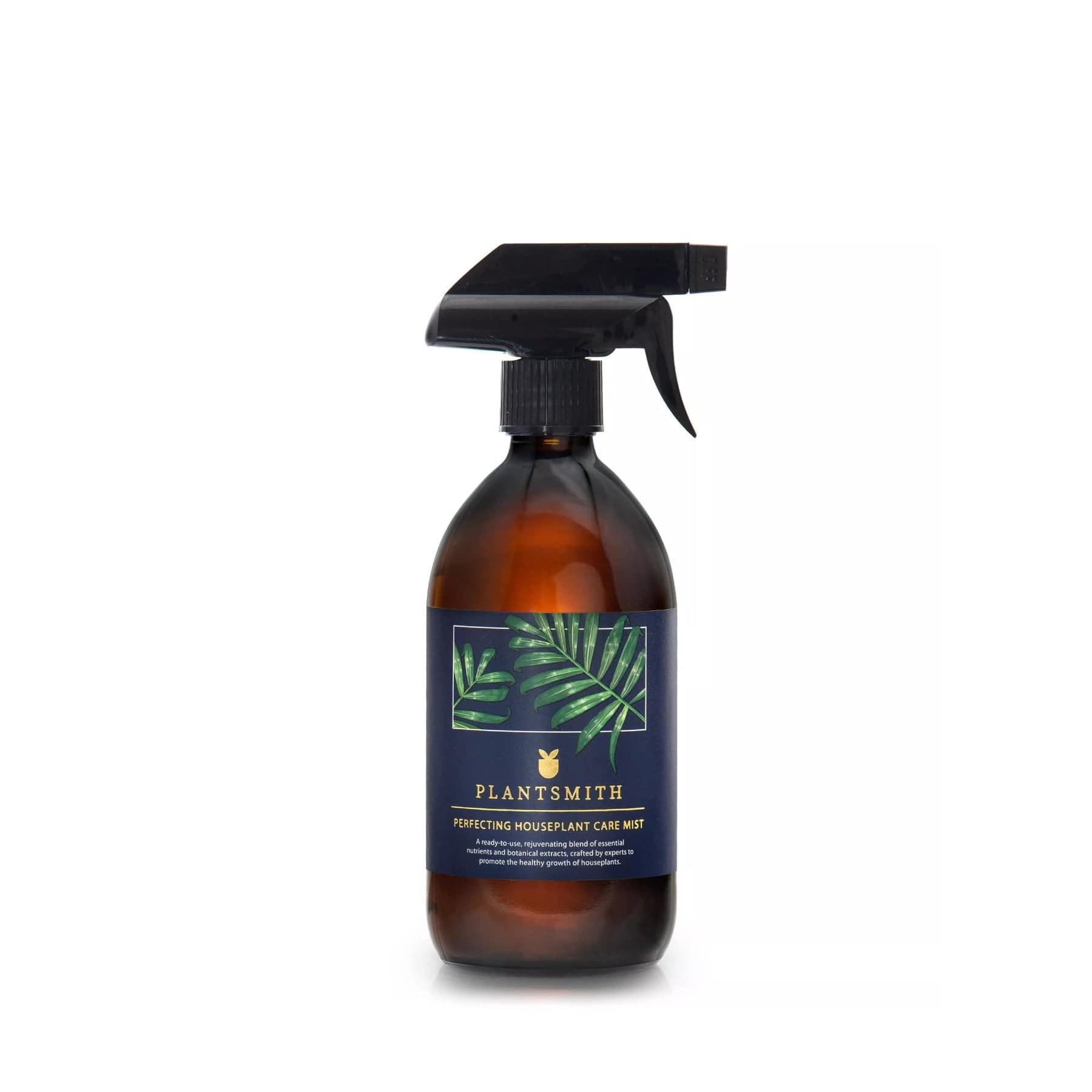 Amber glass bottle of Plantsmith Perfecting Houseplant Care Mist with a black spray nozzle on an isolated white background
