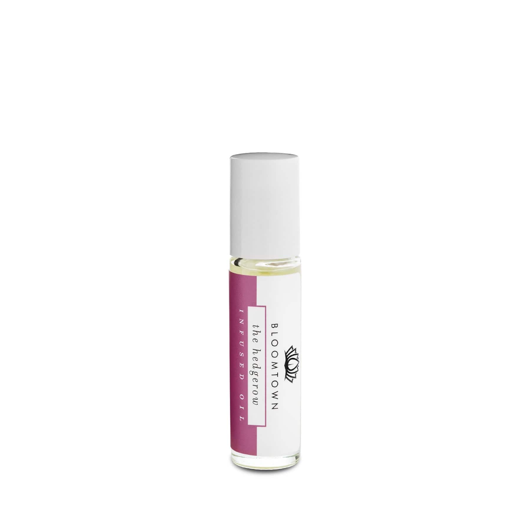 Rollerball perfume oil, Bloomtown brand, The Hedgerow, infused with berries and meadow flowers, personal care, beauty product, white background.