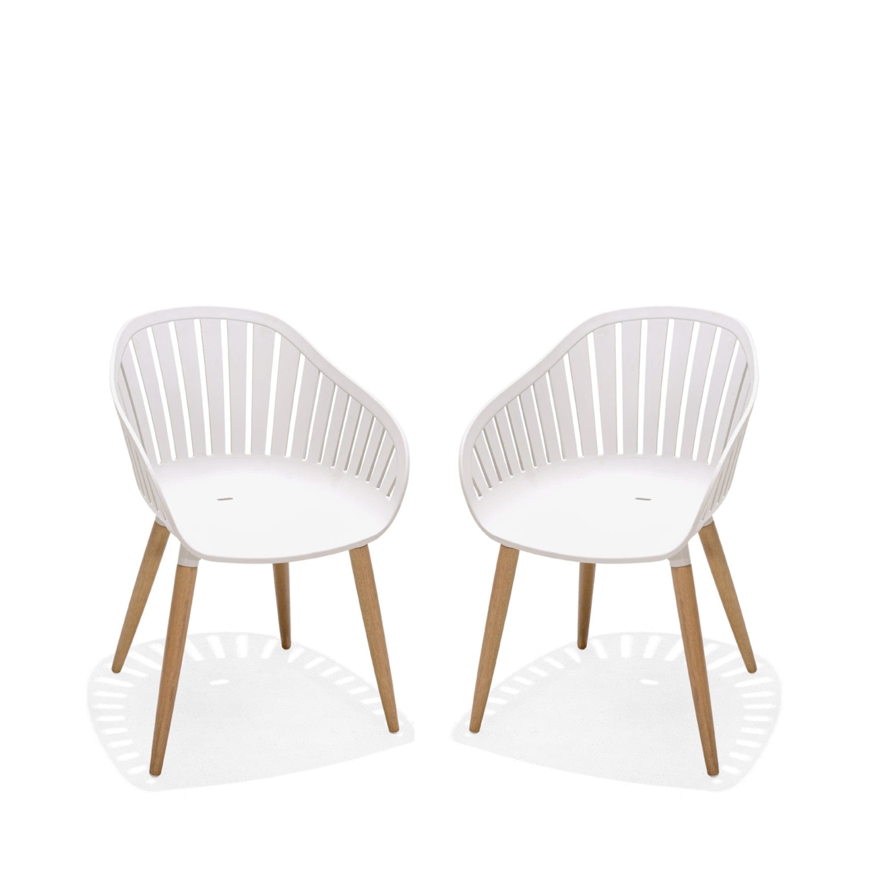 Modern white dining chairs with wooden legs and slatted back design on a white background