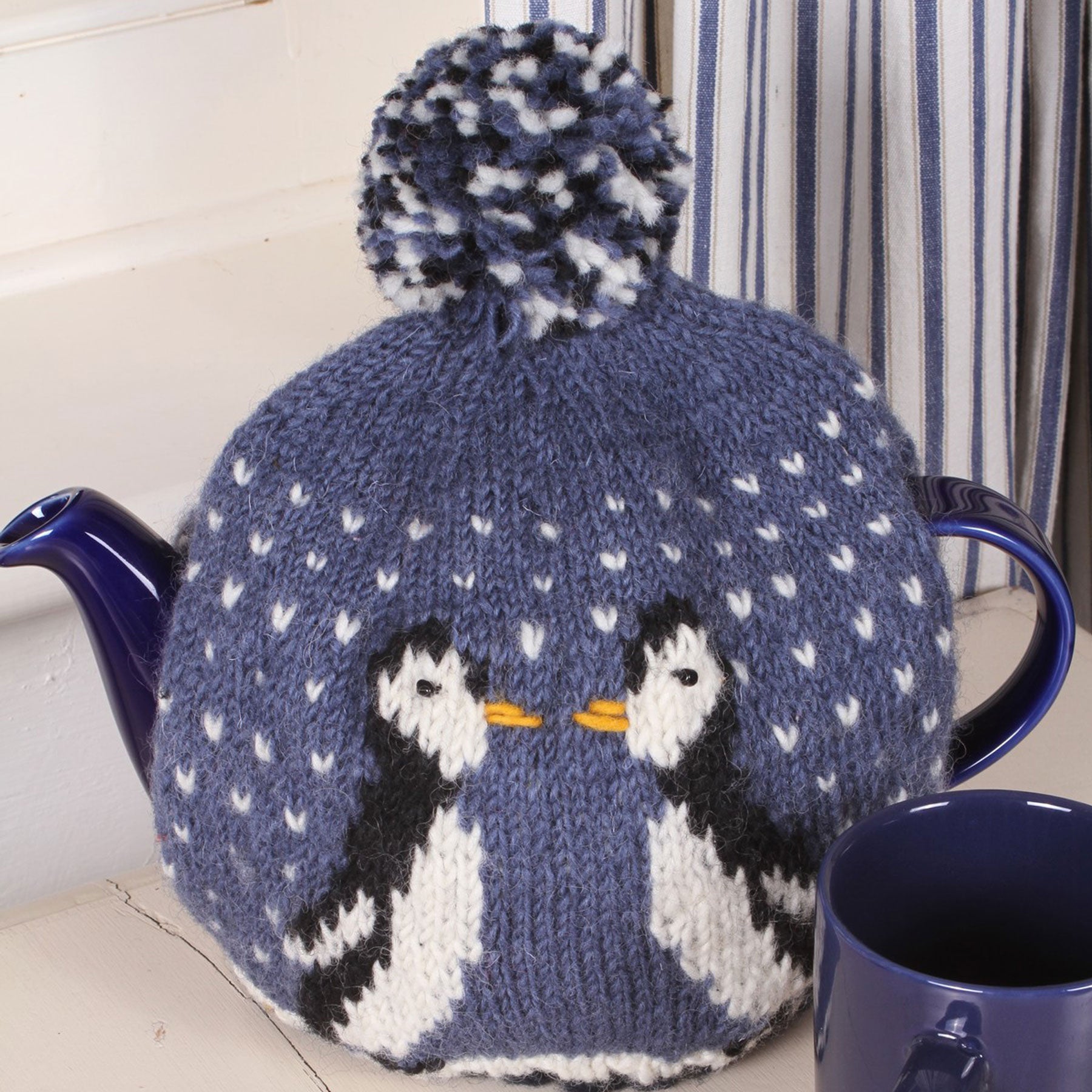 Waddle of penguins tea cosy