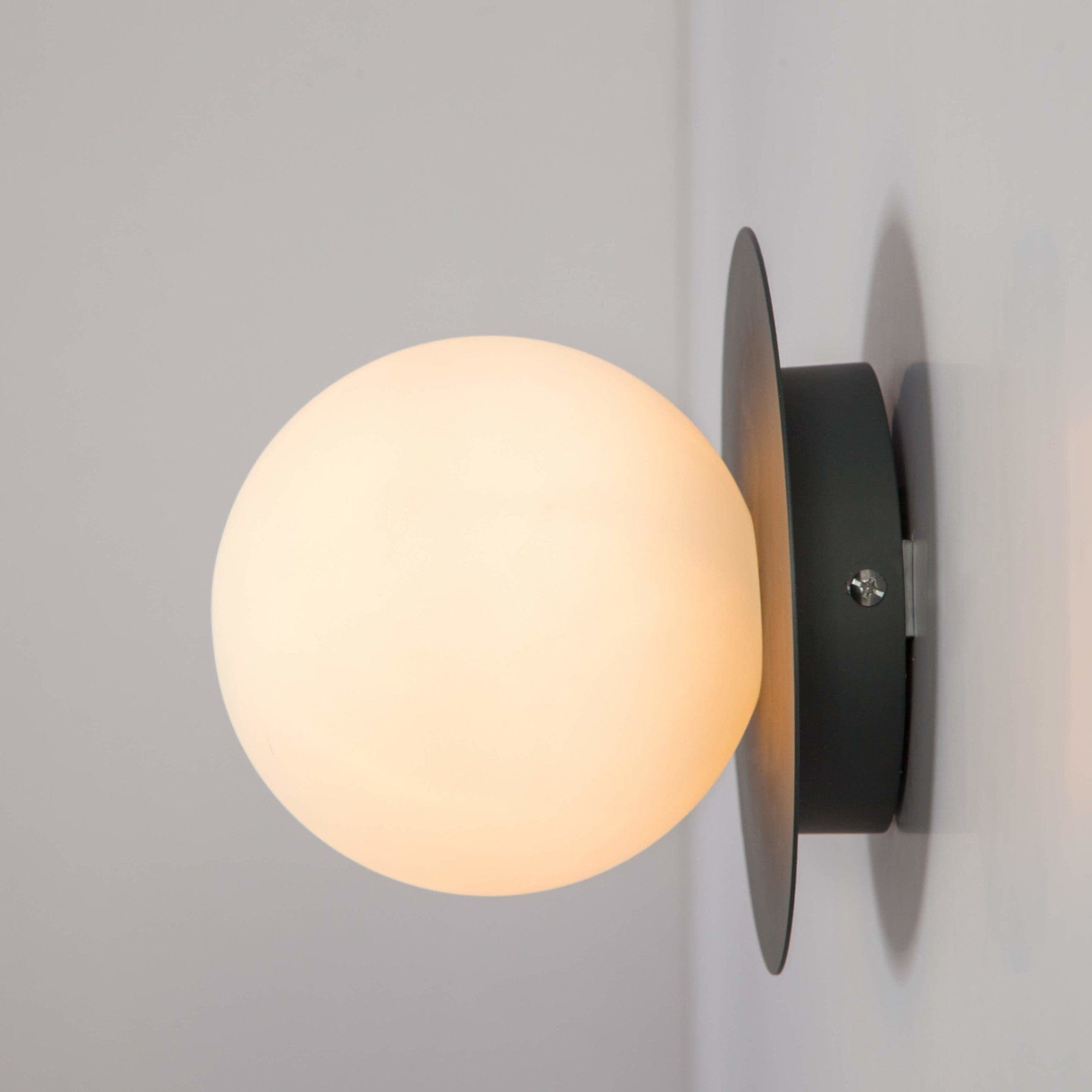 Opal disk wall light