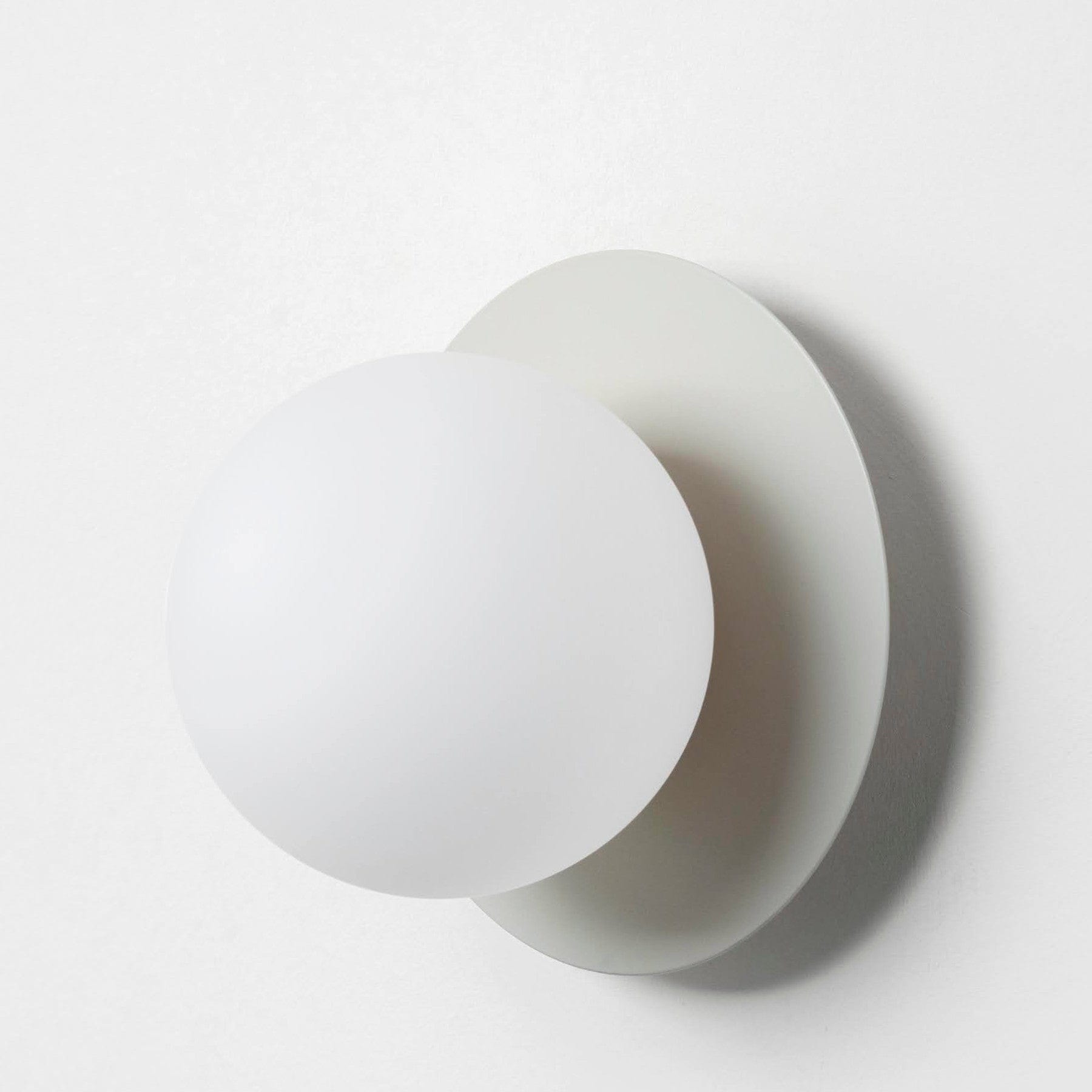 Opal disk wall light